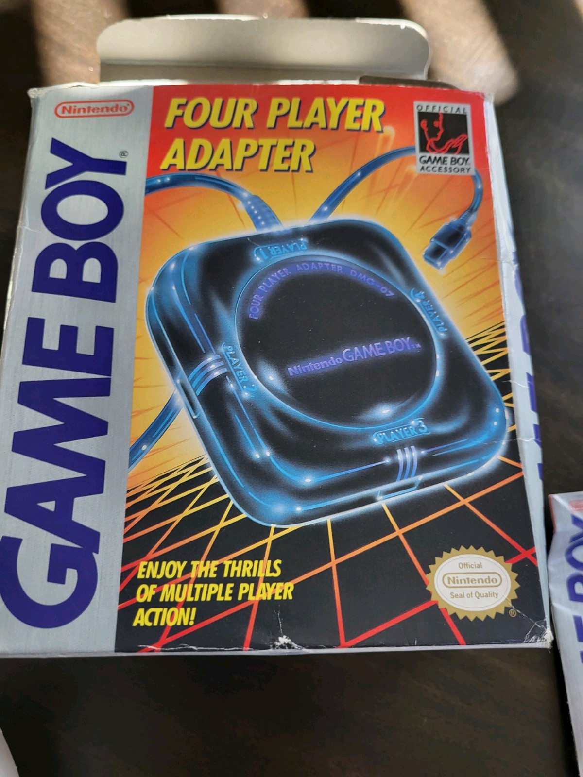 4 Player Adapter box art for GameBoy